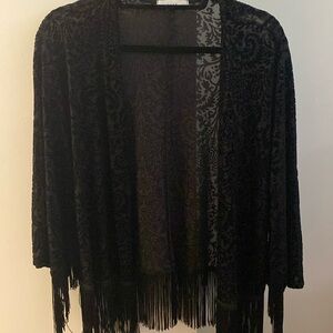 Black shoulder cover up - polyester/nylon/spandex.